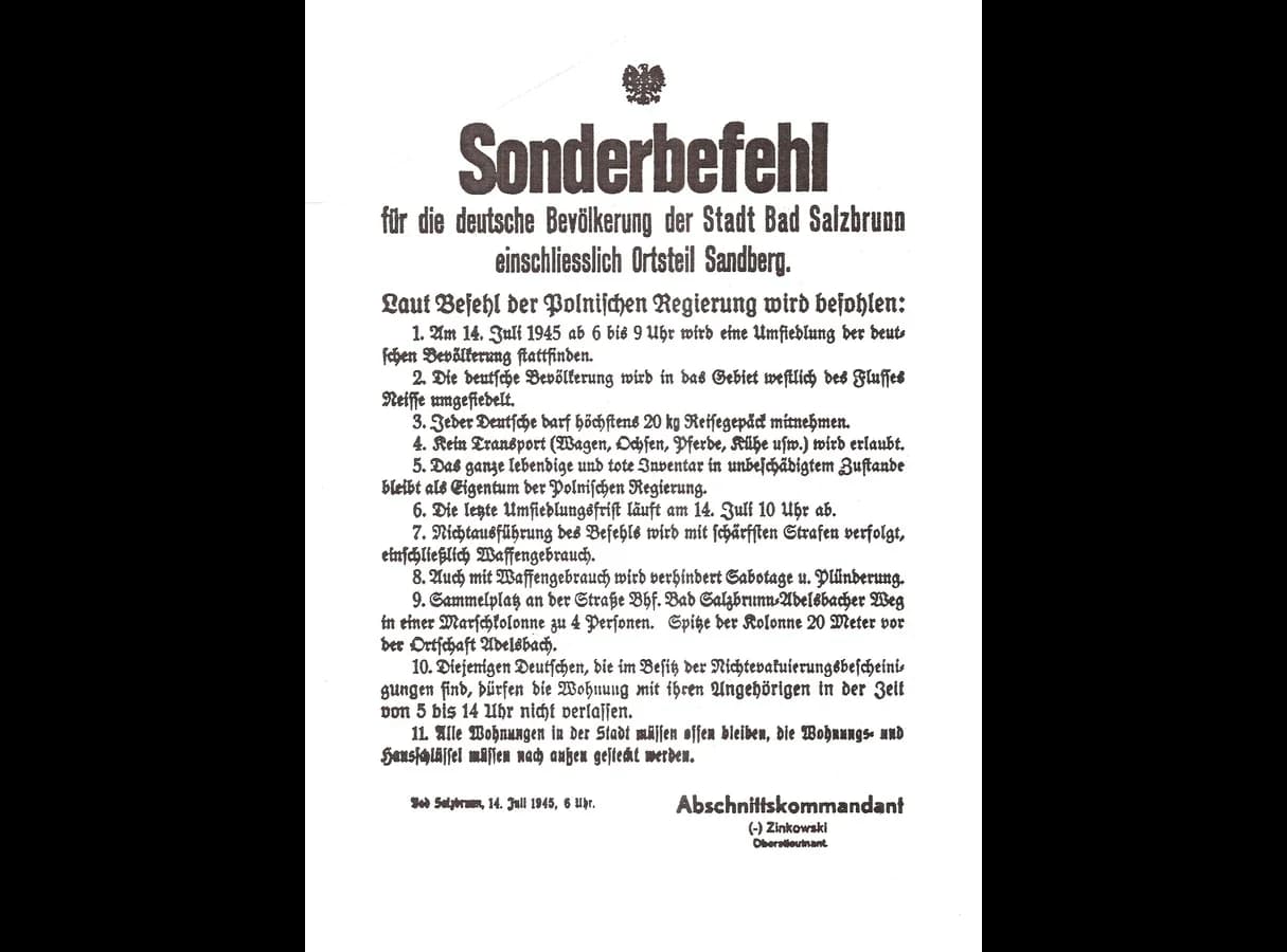 Printed German-language poster headed Sonderbefehl (special order) under a Polish eagle, addressed to the German population of Bad Salzbrunn, with eleven numbered instructions, dated 14 July 1945, 6 a.m., and signed by Lieutenant-Colonel Zinkowski, section commander.